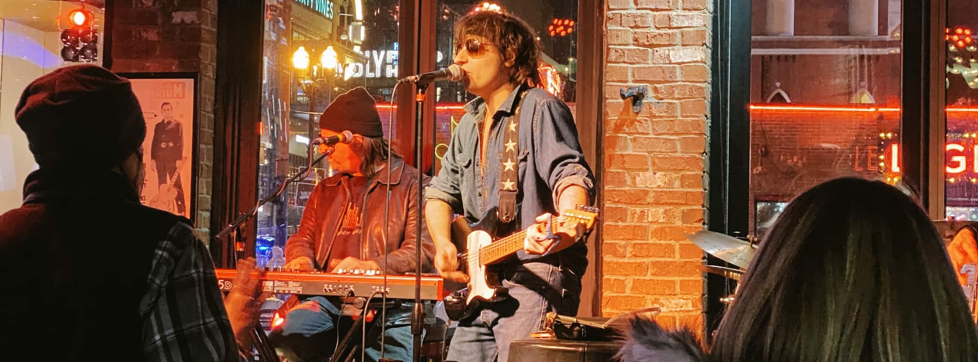 bar singer on guitar in Omaha