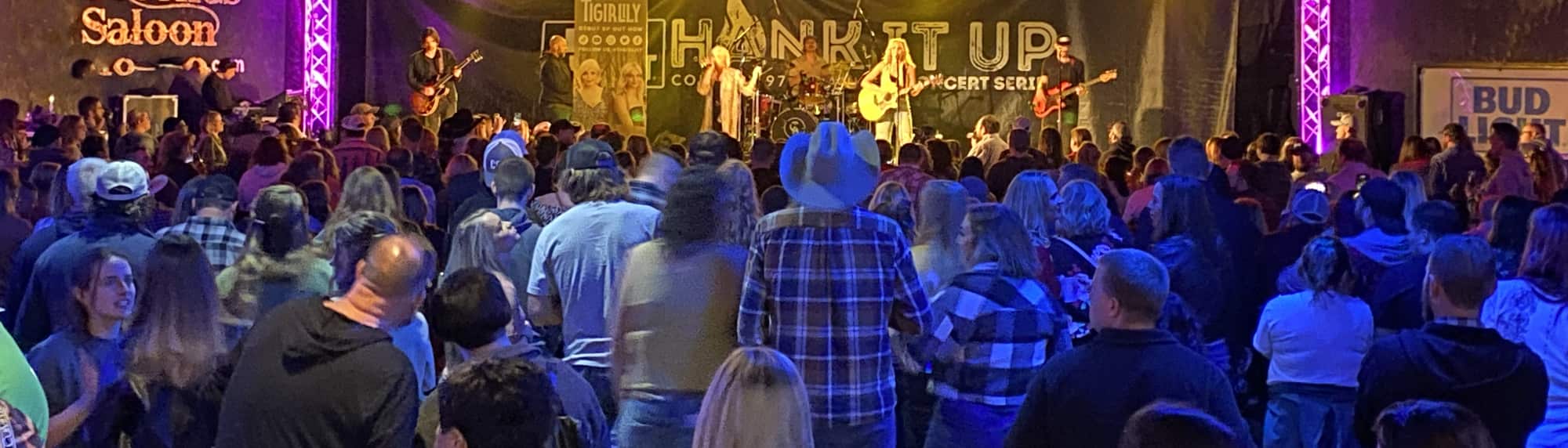 country concert with fans wearing cowboy hats Omaha