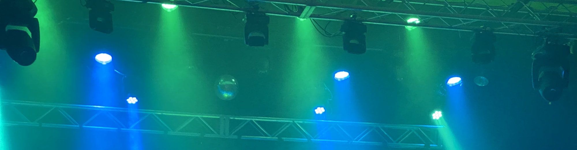 blue and green theater stage lights Omaha